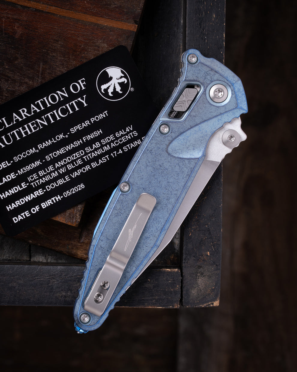 Microtech Gear SOCOM® RAM-LOK® SPEAR POINT MARFIONE SELECT STONEWASH FINISH ICE BLUE ANODIZED SLAB SIDE TITANIUM W/ BLUE TITANIUM ACCENTS DOUBLE VAPOR BLAST STAINLESS (160RLS-10SMS7)