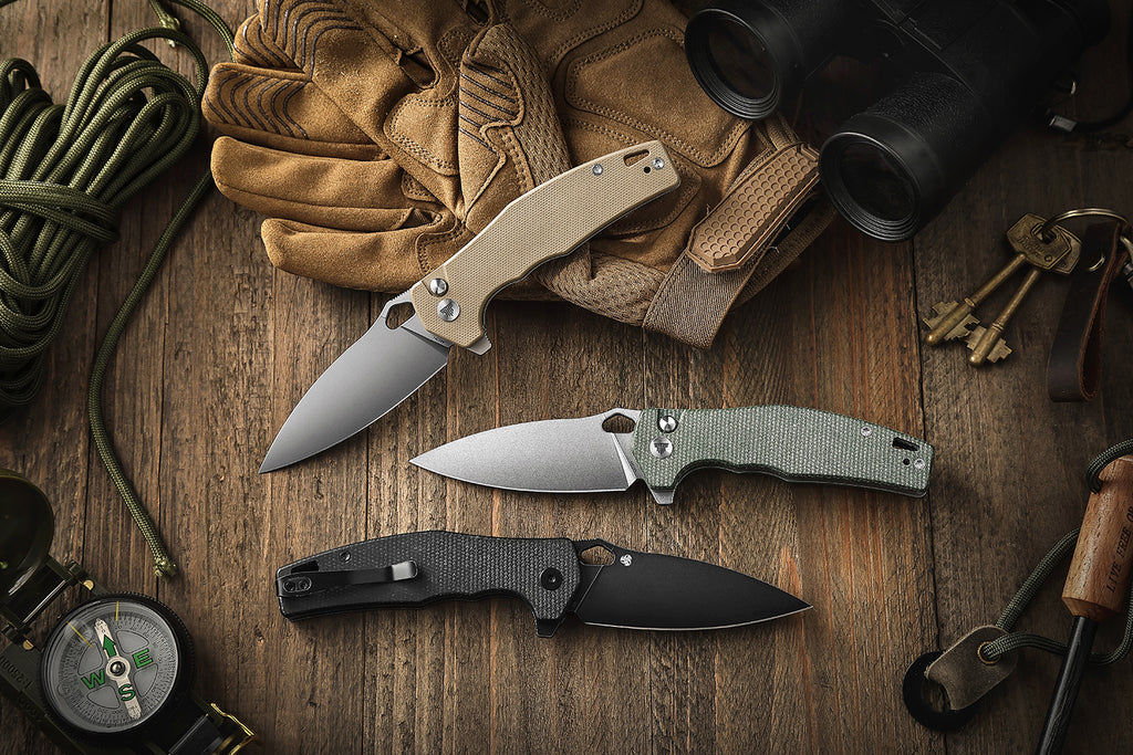 TRIVISA Corvus-03N,Button Lock Pocket Folding Knfe,3.16'' 14C28N Steel blade,G10 Handle,Hydra Design