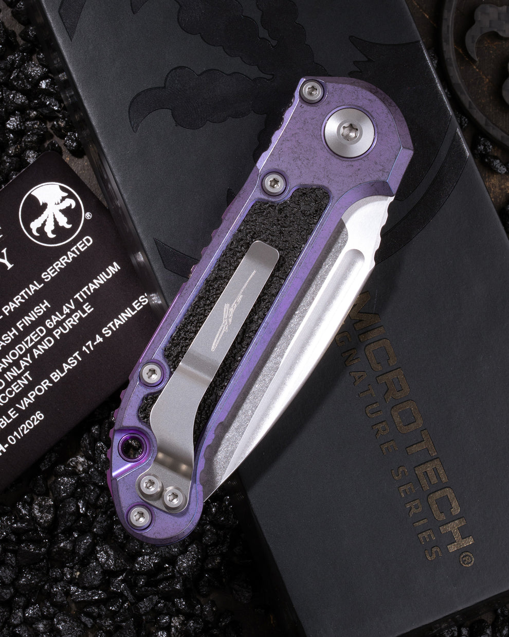 MICROTECH L.U.D.T – CLIP POINT PARTIAL SERRATED MARFIONE SELECT STONEWASH FINISH PURPLE HAZE ANODIZED TITANIUM W/TEXTURED INLAY AND PURPLE TITANIUM ACCENT DOUBLE VAPOR BLAST STAINLESS